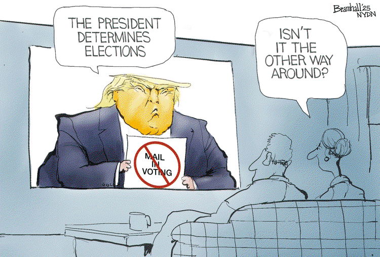 Donald Trump on television holding a sign reading 