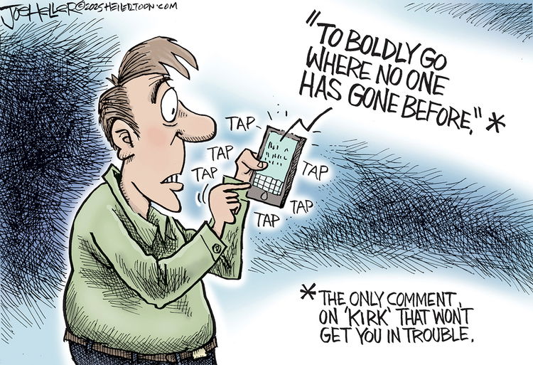 Image:  Man typing into cell phone, 